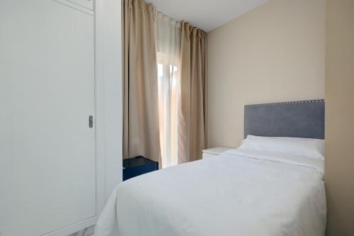 Postel nebo postele na pokoji v ubytování Hostal 37