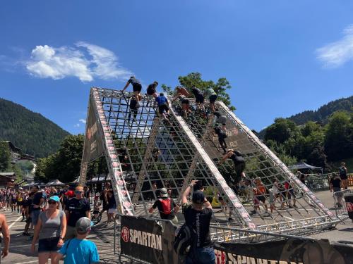a group of people on top of a metal structure at Chalet Aventure B&B Les Gets in Les Gets