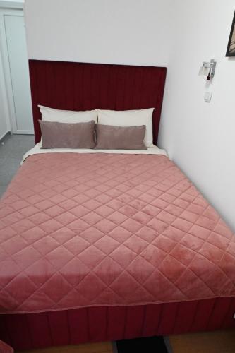 Ein Bett oder Betten in einem Zimmer der Unterkunft Apartments Imper - IMD
