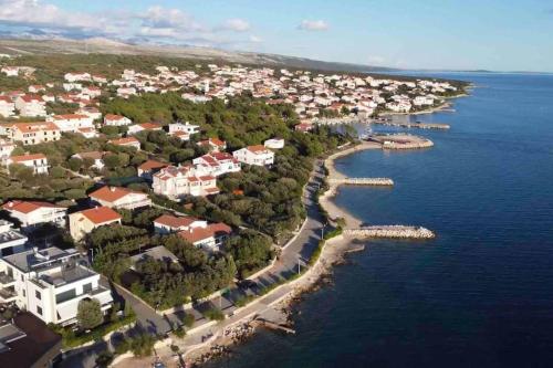 an aerial view of a small island in the water at Clear Water Apartment - Sea and Sun in Mandre
