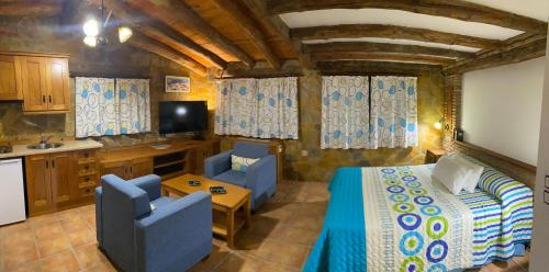 Kuchyň nebo kuchyňský kout v ubytování Alhanda Apartahotel