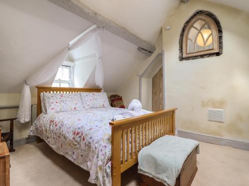 Postel nebo postele na pokoji v ubytování Tyn Y Coed Cottage