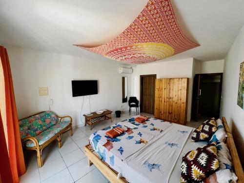 Katil atau katil-katil dalam bilik di All Nations Holiday Home