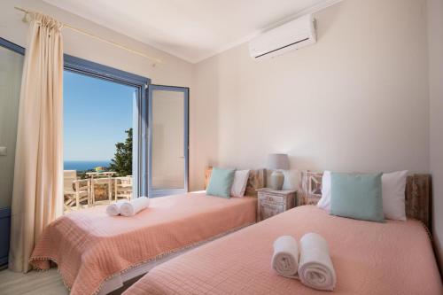 Postel nebo postele na pokoji v ubytování Cielo by Vintage Travel