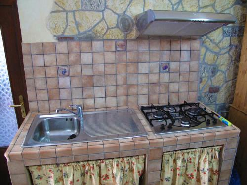 Una cocina o cocineta en Diving Center Punta Stilo