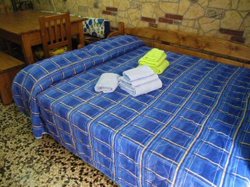 Una cama o camas en una habitación de Diving Center Punta Stilo
