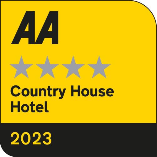 a sign for a county house hotel with stars at Loch Rannoch Hotel and Spa in Kinloch Rannoch