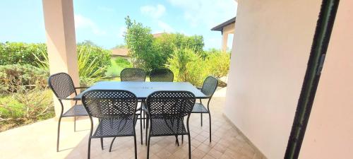 a table and chairs sitting on a patio at Antico Principato di Seborga in Vallebona