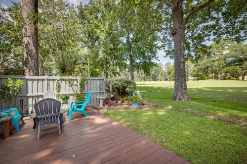 a deck with chairs and a table in a yard at Community Pool Access Montgomery Retreat! in Montgomery