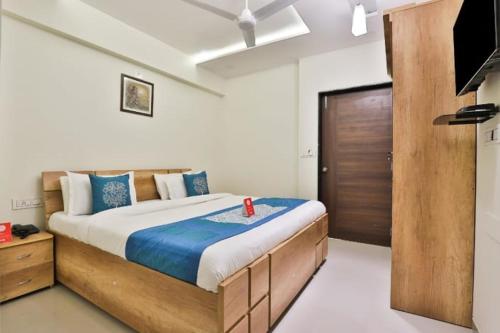 Voodi või voodid majutusasutuse Hotel Shiv Inn toas