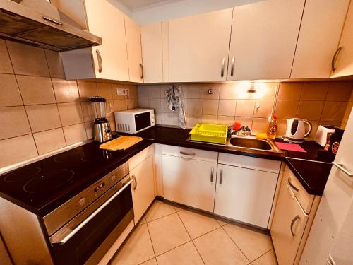 Dapur atau dapur kecil di Zoe apartman