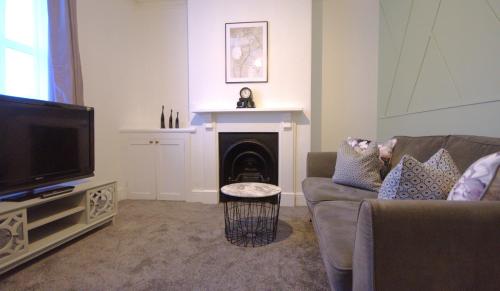 Zona d'estar a Modern 3 Bedroom Home in Northampton by HP Accommodation - Free Parking & Super Fast WiFi