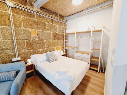 Postel nebo postele na pokoji v ubytování Edificio Amalia Rosina 1ºA
