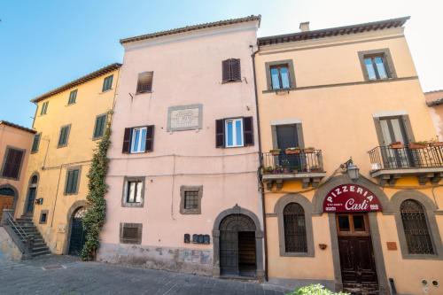 an old building in a street in a town at Appartamento Casti in Montefiascone