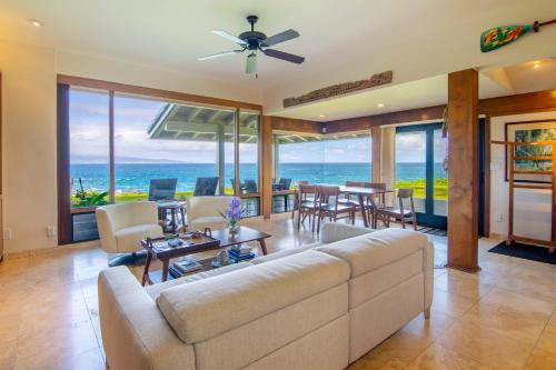 a living room with a couch and a table at Kapalua Villas Maui - Select Your Unit in Kahana