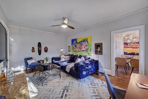 a living room with a couch and a table at The Home Collection CLT: Lamar Avenue in Charlotte