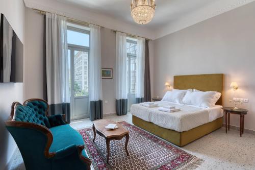Postel nebo postele na pokoji v ubytování Athenian Vintage Apartments