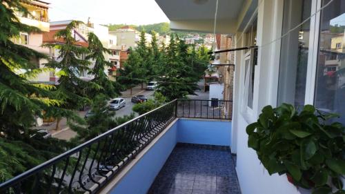 a balcony with a view of a street at LEVI Apartment in Pogradec