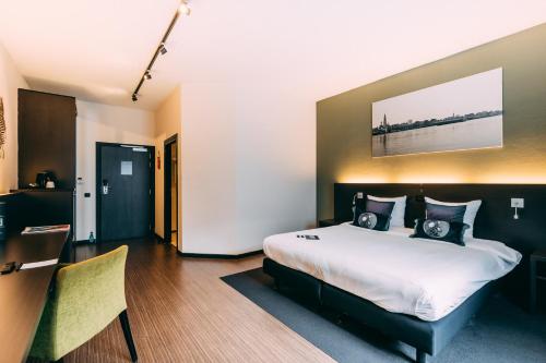 Postel nebo postele na pokoji v ubytování Hotel Ter Elst