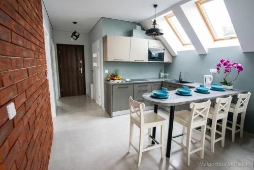 Η κουζίνα ή μικρή κουζίνα στο Apartamenty u Edzi