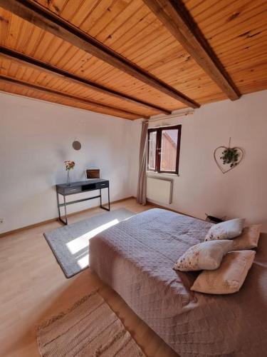 Postel nebo postele na pokoji v ubytování Maison Alsacienne au cœur du vignoble