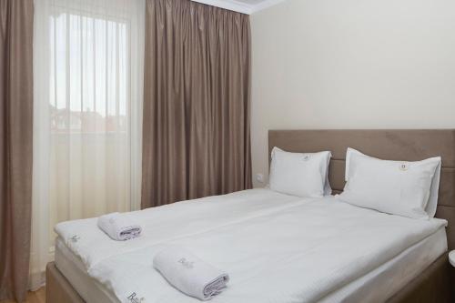 Katil atau katil-katil dalam bilik di Bellicity Apart Complex