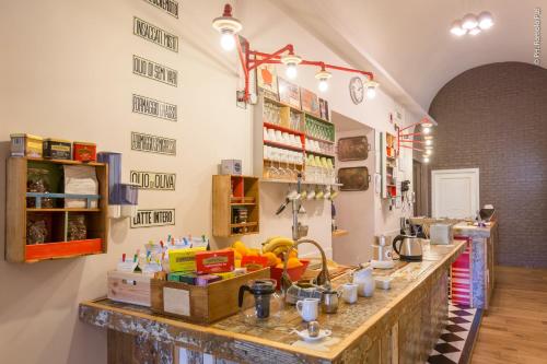a kitchen with a counter with food on it at The Bellini House by House In Naples in Naples