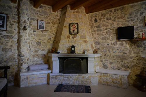 A television and/or entertainment centre at Traditional Stone Mezonete
