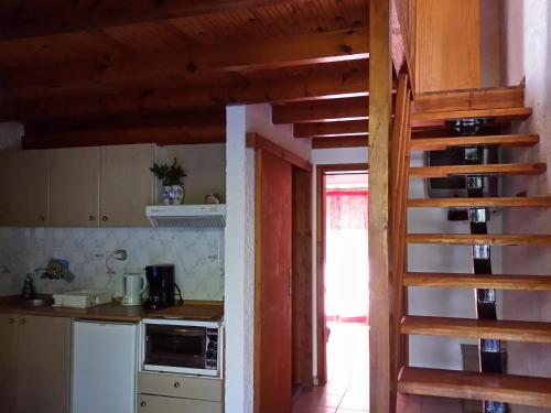 Kuchyň nebo kuchyňský kout v ubytování Olive tree Cottages