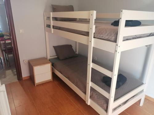 a couple of bunk beds in a room at ASTERIDE in Afitos