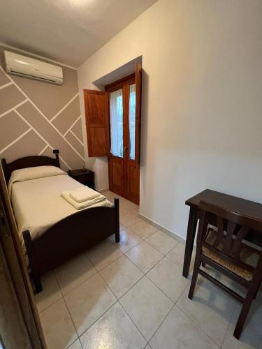 Кровать или кровати в номере B&B alle Roverelle