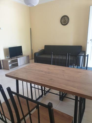 Телевизор и/или развлекательный центр в Plaza Apartments