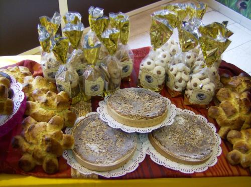 a table with plates and pastries on top of it at Maison de 2 chambres avec vue sur la ville a Chalabre a 4 km de la plage in Chalabre