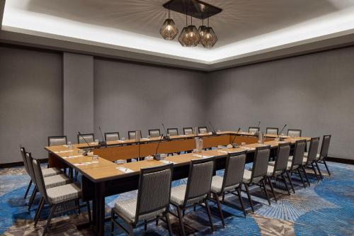 a large conference room with a long table and chairs at Crystal Gateway Marriott in Arlington