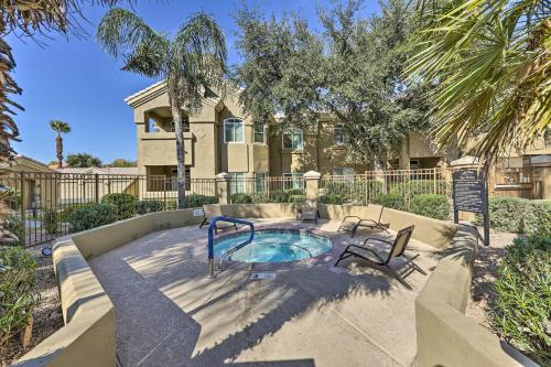 a hot tub in the backyard of a house at Lovely Estero Condo Community Perks and Pool Access in Estero