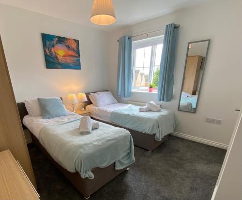 Postel nebo postele na pokoji v ubytování Oakley Vale - 3 Bed Home, Garden Corby