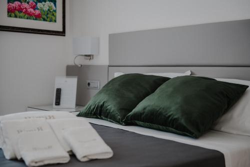 Postel nebo postele na pokoji v ubytování RIMIR Hotel & Centro Benessere