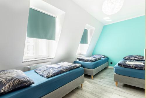 Ένα ή περισσότερα κρεβάτια σε δωμάτιο στο VICE CITY Hostel
