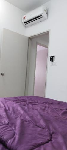 Postel nebo postele na pokoji v ubytování MQA Homestay