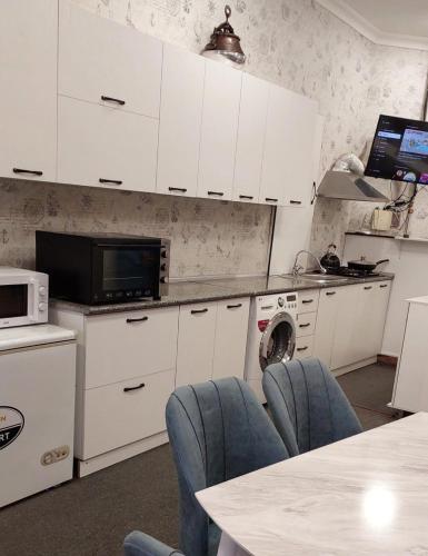 Η κουζίνα ή μικρή κουζίνα στο Hostel.Uz