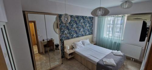 Katil atau katil-katil dalam bilik di OITUZ Boutique Residence