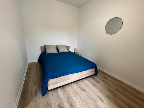 Katil atau katil-katil dalam bilik di Appartement centre-ville de Lure gauche