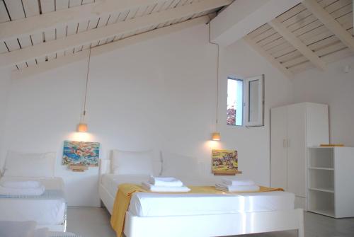Ein Bett oder Betten in einem Zimmer der Unterkunft Katelios Farm House Loft