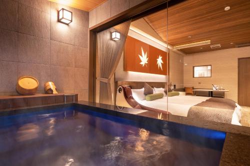 Una cama o camas en una habitación de Kinsuikan