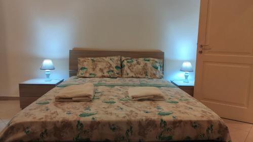 Un ou plusieurs lits dans un hébergement de l'établissement Appartamento Corso Savoia