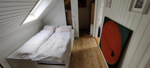A bed or beds in a room at Beautiful apartment in the heart of Reykjavik