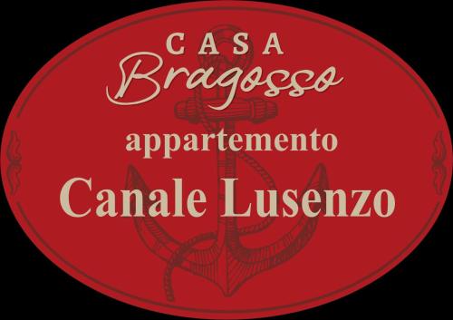 a red sign with the words csalezlezapaapaapaapaapa caramel at Casa bragosso in Sottomarina