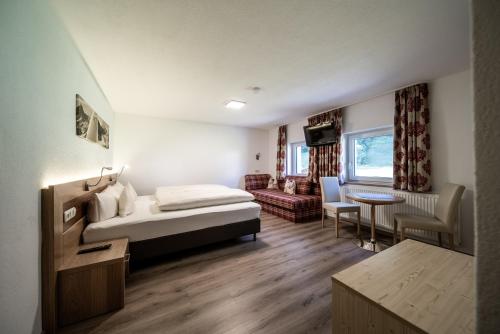 Postel nebo postele na pokoji v ubytování Appartements Tyrol