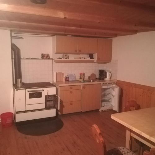 Kuchyň nebo kuchyňský kout v ubytování Ferienhütte Heinle