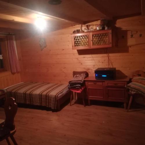 Postel nebo postele na pokoji v ubytování Ferienhütte Heinle